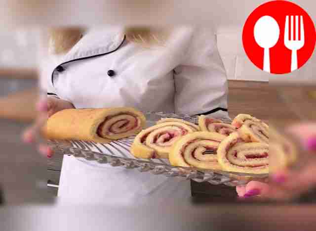 Sponge roll with jam and sour cream