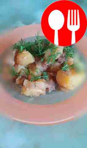 Stewed potatoes with champignons in melted butter