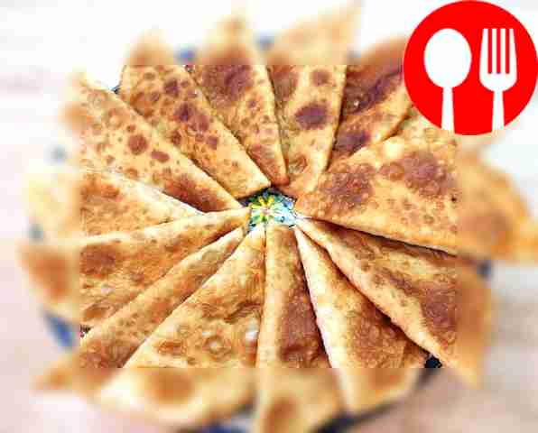Chebureks with cottage cheese and herbs