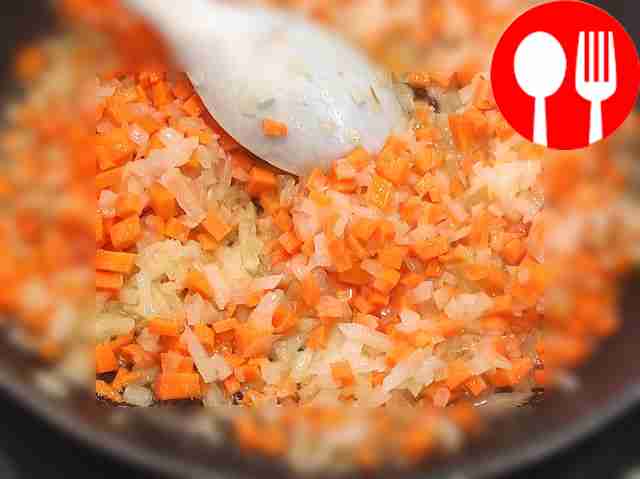 Place the onion in a frying pan with heated...