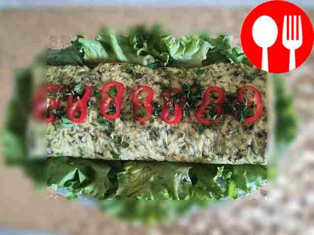 Zucchini roll with tomatoes and herbs