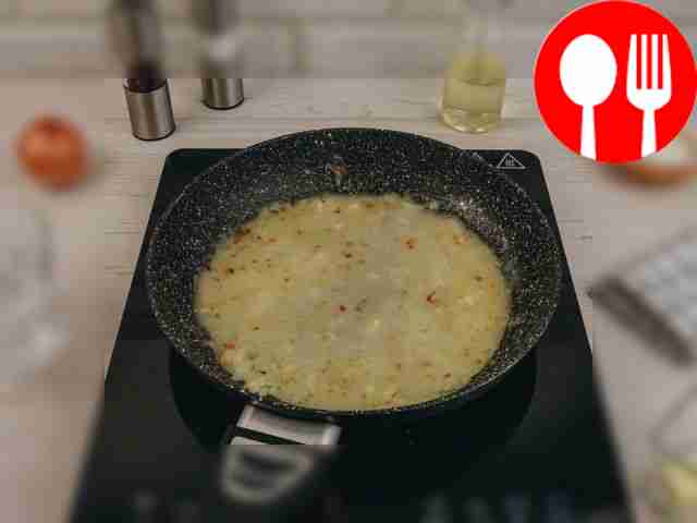 Pour warm boiled water into the pan.