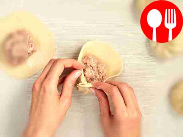 Make a khinkali. Roll the dough into a sausage...