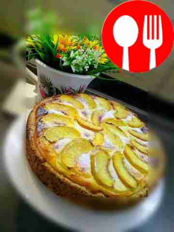 Decorate the peach pie with sliced ​​fresh...