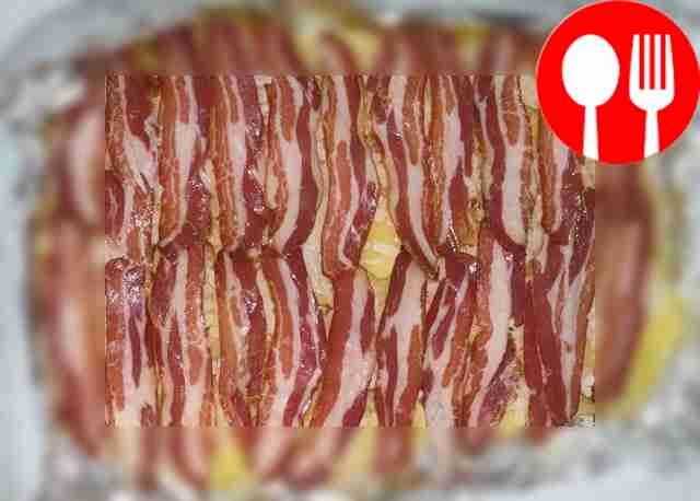 Place strips of bacon on top of the cheese and...