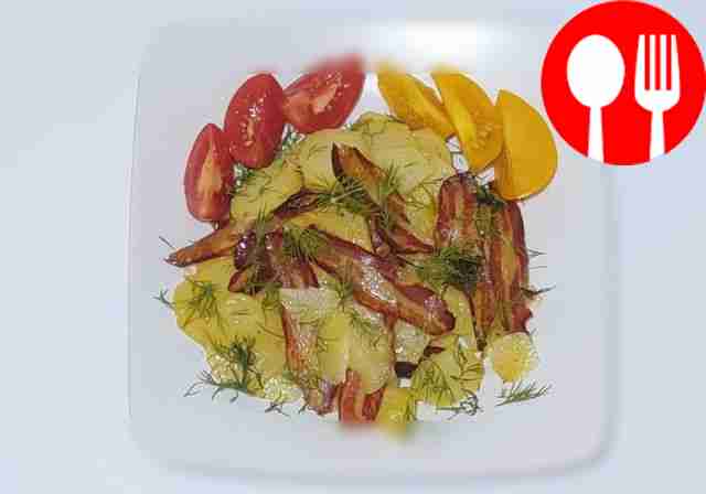 Place potatoes and bacon on a plate, sprinkle...