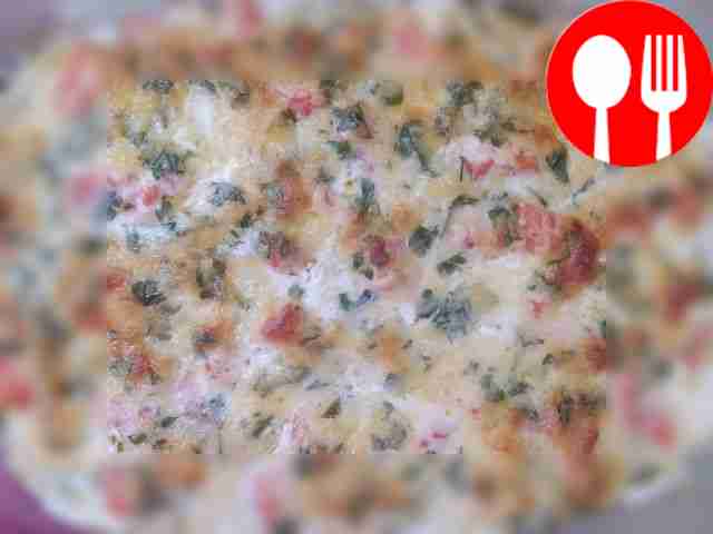 Salmon baked with potatoes and cream cheese sauce