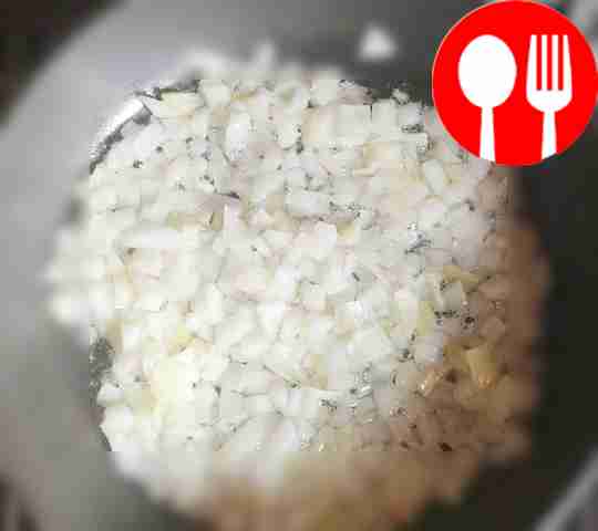 Lightly fry the pieces of fish in a dry frying...