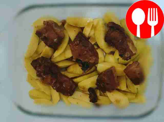 Place the canned fish on top of the potatoes....