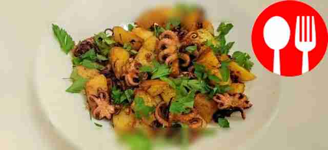 Octopus fried with potatoes and thyme