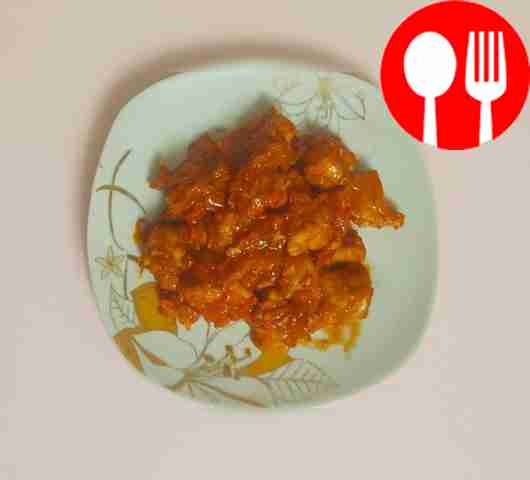 Bright turkey with vegetables in tomato sauce