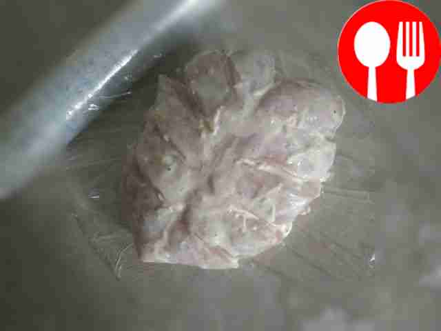 Brush the breasts evenly with the sour cream...