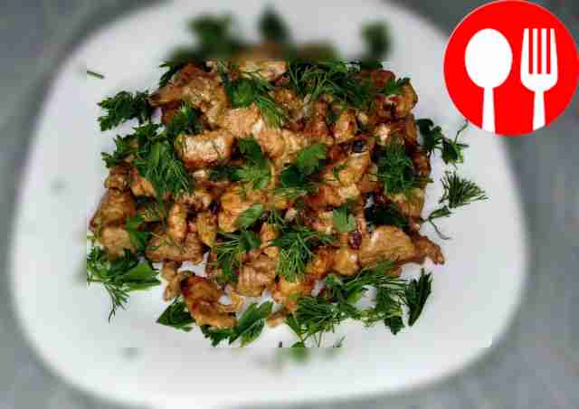 Fried meat with mushrooms