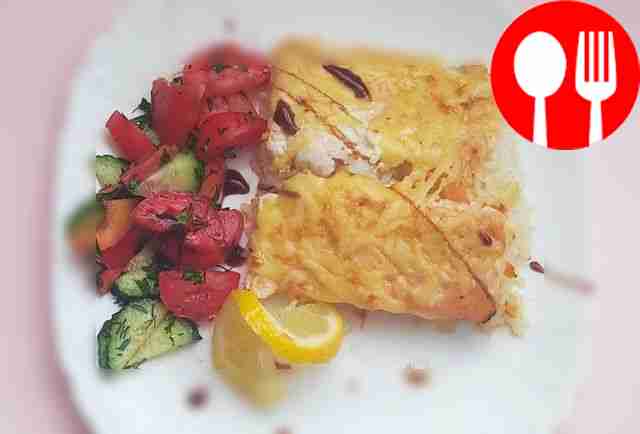 Pink salmon with rice in the oven