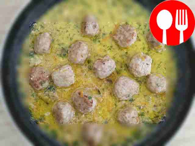 Place the browned meatballs in a...