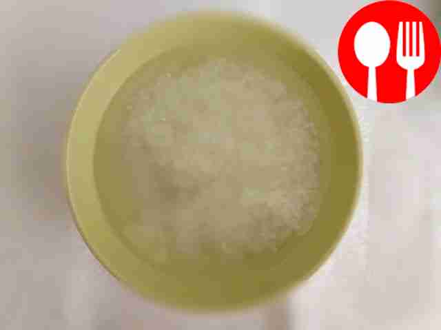 Pour boiling water over the washed rice, cover...