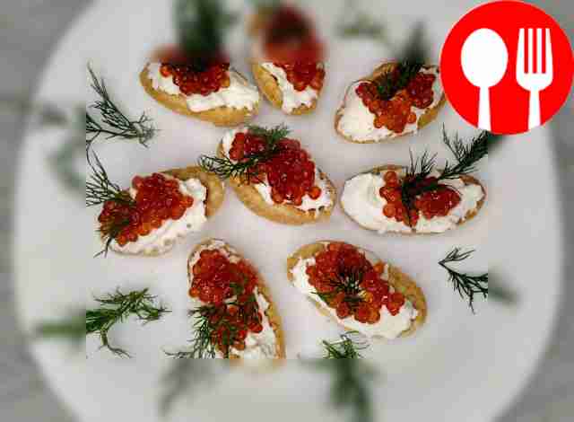 Tartlets with curd cheese and red caviar