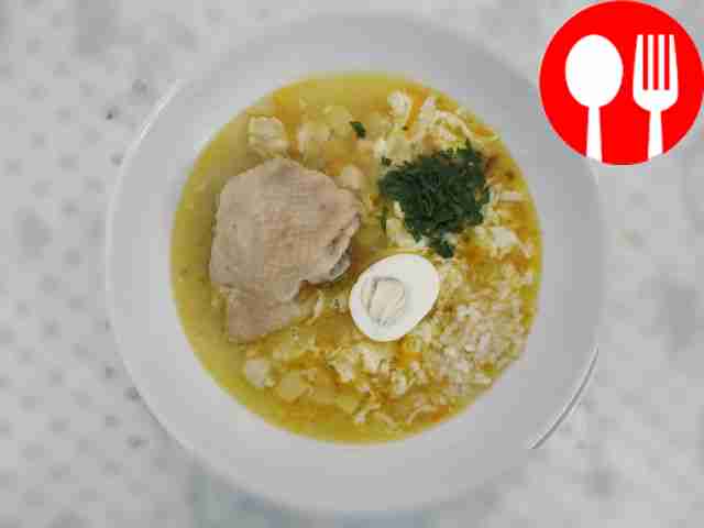 Rice soup with chicken and boiled egg