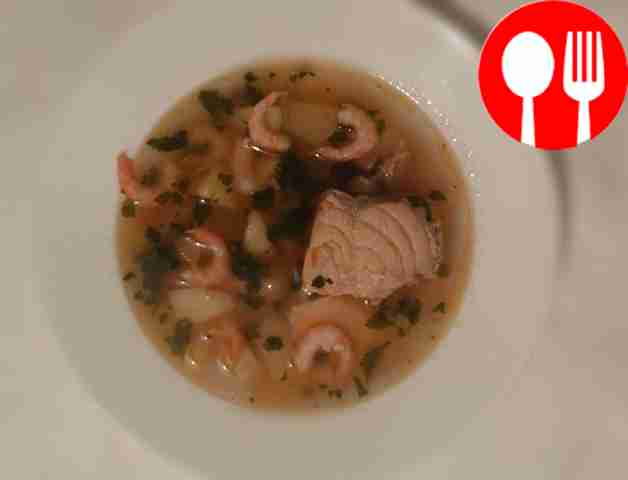 Fragrant salmon fish soup with shrimps