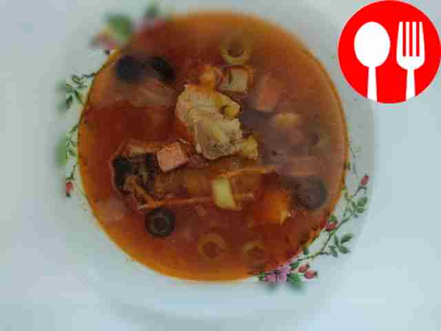 Meat solyanka with smoked ribs and cucumbers