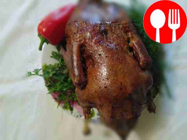 Appetizing duck with apples, baked in the oven