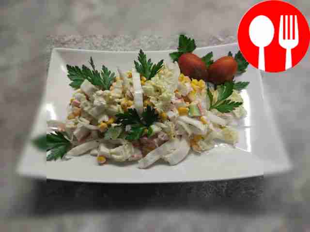 Quick salad with crab sticks