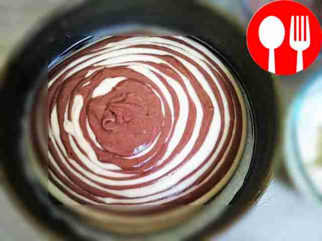 Place 2 tablespoons of dark dough in the...