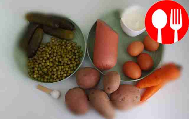 Wash and boil potatoes, carrots. Boil the eggs hard.