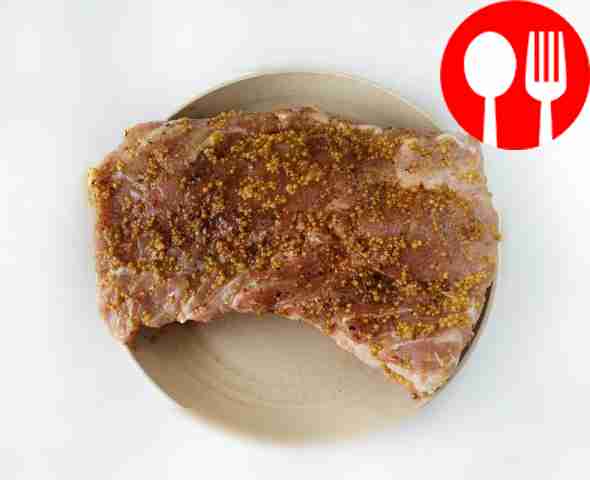 Dry the washed meat, coat with mustard, salt...