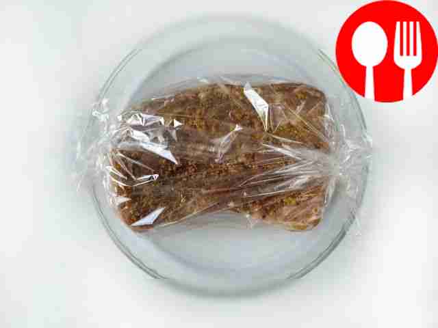 Place the pork in a baking sleeve, use a...