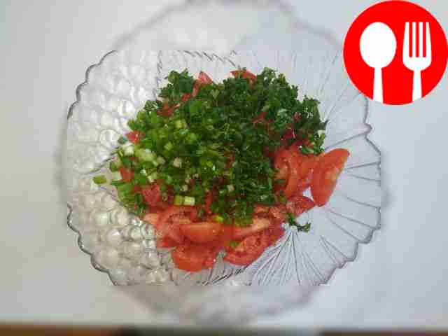 Finely chop the greens, sprinkle tomatoes on...