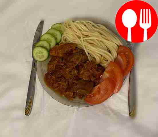 Подавайте блюдо, разместив на тарелке порцию...