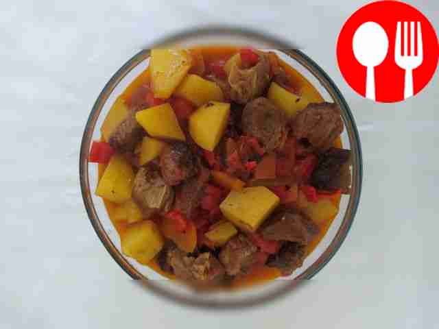 Serve potatoes stewed with beef and bell...