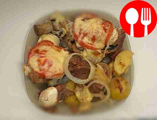 Мясо, запеченное с картофелем и шампиньонами