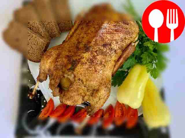 Duck baked with apples and soy sauce