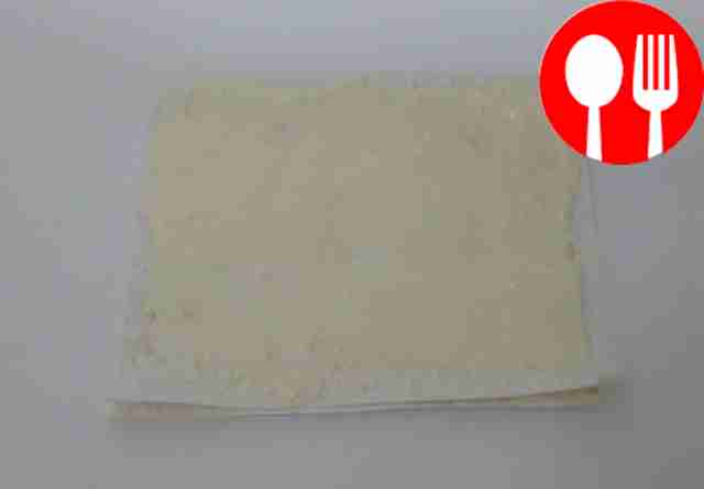 Unfold the lavash sheet and spread the curd...