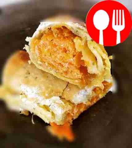 Unleavened dough pies with stewed carrots