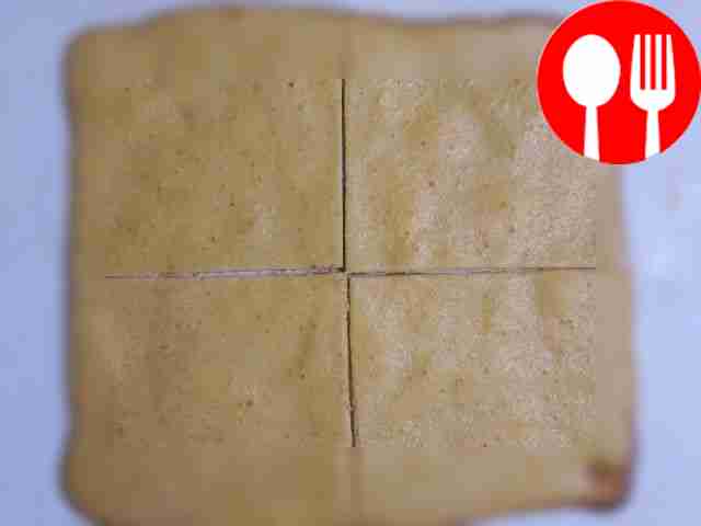 Place the pan with the dough in an oven...