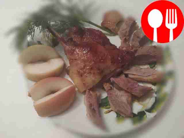 Festive duck in mustard-honey marinade with garlic, baked in the oven