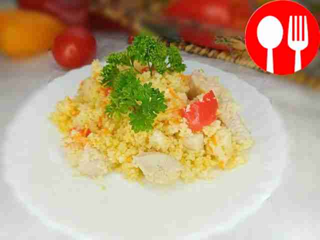 Appetizing couscous with chicken breast and vegetables