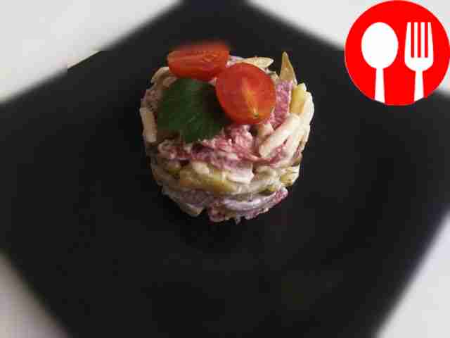 Spicy salad with semi-smoked sausage