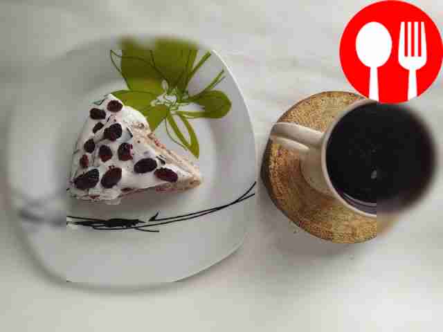 Coffee cake with ice cream and cranberries