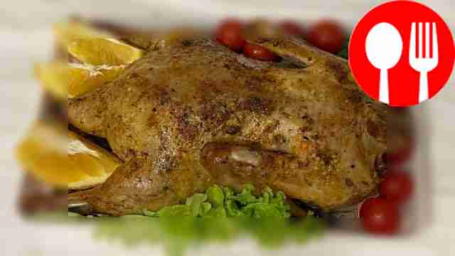 Roasted juicy duck in foil