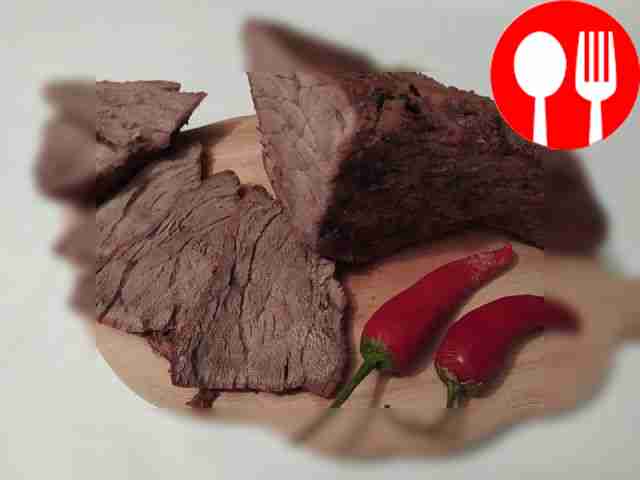 Beef baked with spices in foil