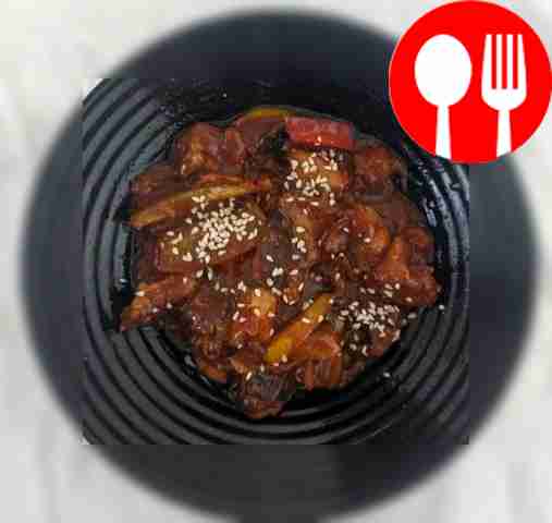 Juicy pork in sweet and sour sauce