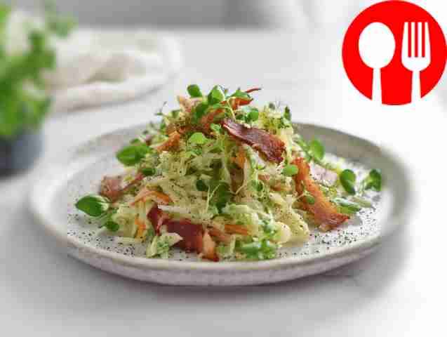 Vitamin salad of green radish with bacon