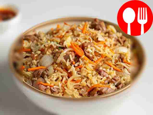 Рассыпчатый плов из свинины с легким ароматом чеснока