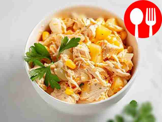 Salad with chicken, pineapple, cheese and egg