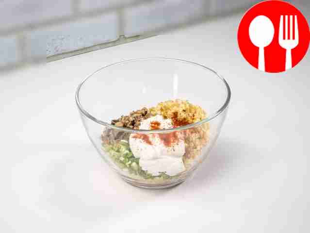 In a deep bowl, combine chicken, bulgur,...