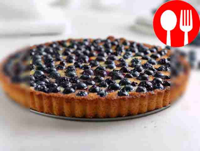 Delicious pie with cloudberries and blueberries